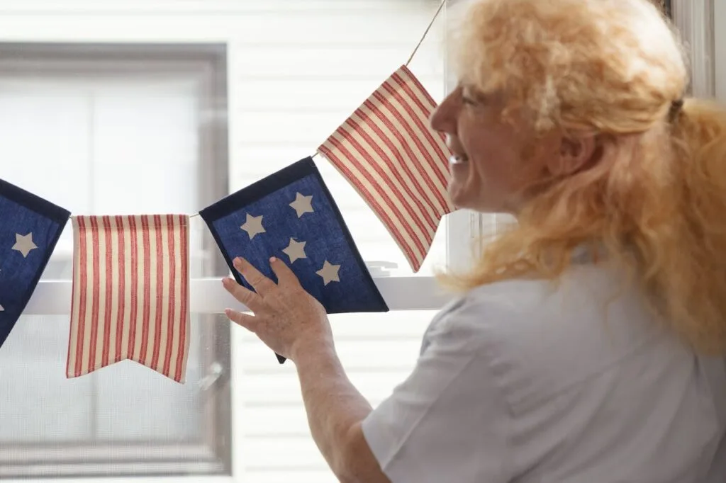 Decorate your physical store with patriotic themes to create a festive and respectful atmosphere. Use flags, banners, and red, white, and blue decorations to celebrate the holiday.