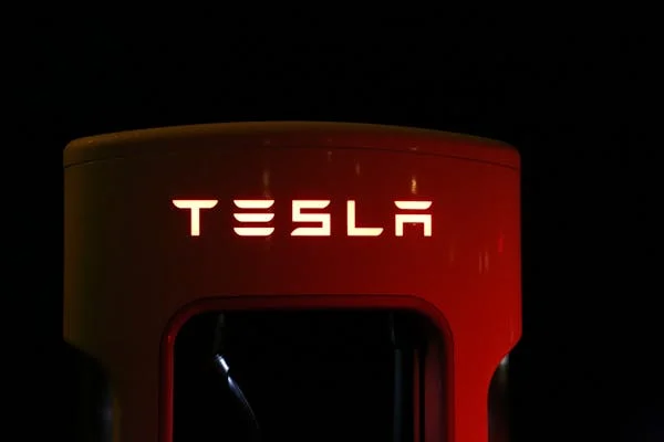Its battery innovations lead the industry in range and efficiency. The company also develops its own manufacturing systems, like the Gigapress, to scale production and reduce cost.