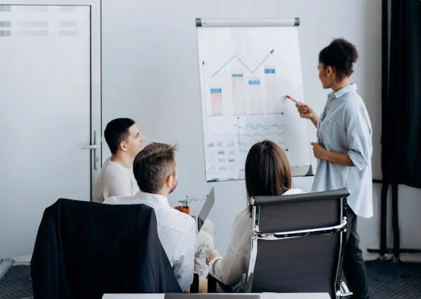 Hold weekly cross-functional stand-ups. Track goals. Unblock issues. Keep momentum going.